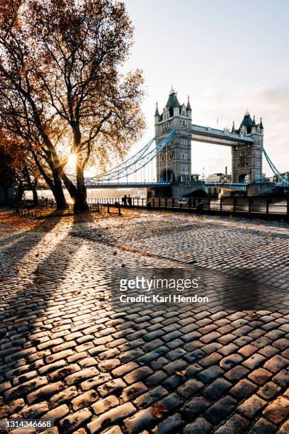 a sunrise view of london's tower bridge - stock photo - tower bridge london stock pictures, royalty-free photos & images