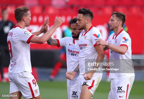 Lucas Ocampos of Sevilla FC celebrates after scoring their team's second goal with Suso, Luuk de Jong and Ivan Rakitic during the La Liga Santander...