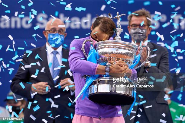 Rafael Nadal of Spain lifts the trophy after his victory against Stefanos Tsitsipas of Greece in their final match during day seven of the Barcelona...