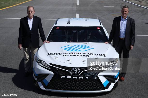 Boys & Girls Clubs of America President and CEO Jim Clark and NASCAR President Steve Phelps pose for photos after the announcement of NASCAR's...