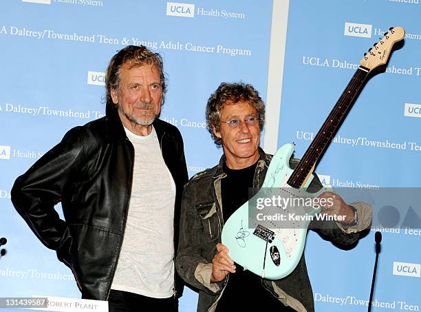 Singers Robert Plant and Roger Daltrey pose at a press conference to announce the Daltrey/Townsend Teen & Young Adult Cancer Program at UCLA on...