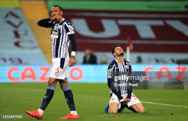 Okay Yokuslu of West Bromwich Albion looks dejected after Keinan Davis scores Aston Villa's second goal during the Premier League match between Aston...