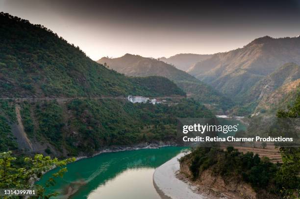 a beautiful sunset view of meandering alaknanda river near srinagar, uttarakhand - rishikesh stock pictures, royalty-free photos & images