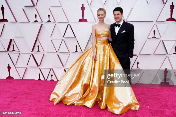 Carey Mulligan and Marcus Mumford attend the 93rd Annual Academy Awards at Union Station on April 25, 2021 in Los Angeles, California.