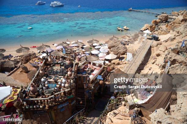 view of popular resort area hadaba bay with beach and cafe farsha - sharm el sheikh stock pictures, royalty-free photos & images