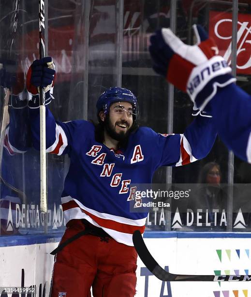 Mika Zibanejad of the New York Rangers celebrates after he scored a hat trick in the second period against the Buffalo Sabres at Madison Square...