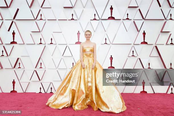 In this handout photo provided by A.M.P.A.S., Carey Mulligan attends the 93rd Annual Academy Awards at Union Station on April 25, 2021 in Los...