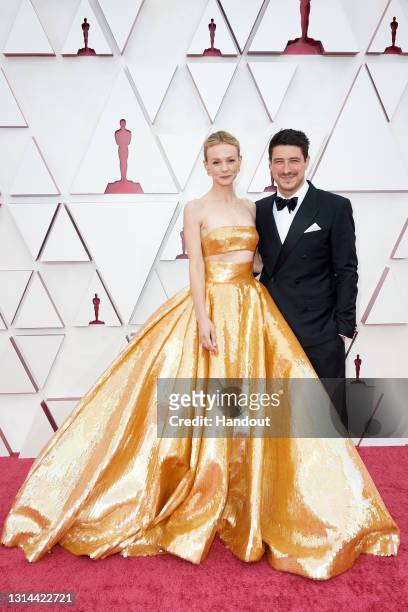In this handout photo provided by A.M.P.A.S., Carey Mulligan and Marcus Mumford attend the 93rd Annual Academy Awards at Union Station on April 25,...