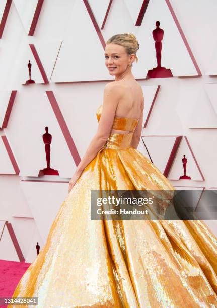 In this handout photo provided by A.M.P.A.S., Carey Mulligan attends the 93rd Annual Academy Awards at Union Station on April 25, 2021 in Los...