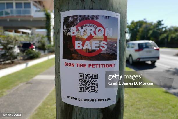 Poster on a telegraph pole asking for the community to sign an online petition against the Netflix programme "Byron Baes" to be filmed in the town...