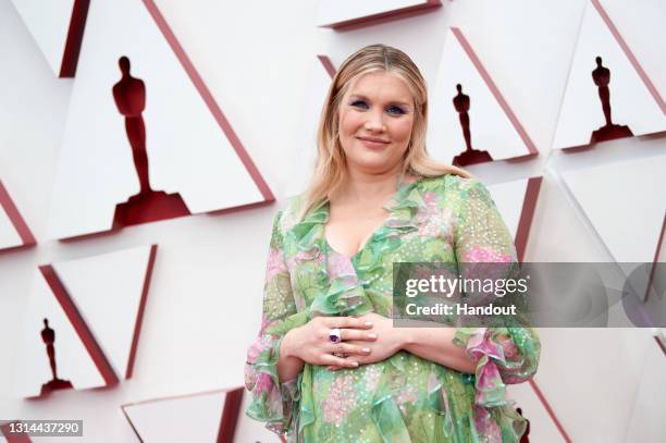 In this handout photo provided by A.M.P.A.S., Emerald Fennell attends the 93rd Annual Academy Awards at Union Station on April 25, 2021 in Los...