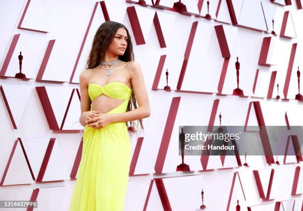 In this handout photo provided by A.M.P.A.S., Zendaya attends the 93rd Annual Academy Awards at Union Station on April 25, 2021 in Los Angeles,...