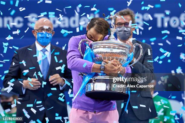 Rafael Nadal of Spain holds the trophy after his victory against Stefanos Tsitsipas of Greece in their final match during day seven of the Barcelona...