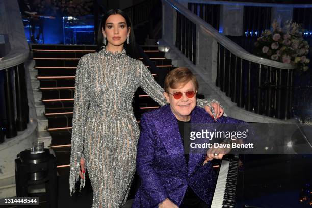 In this image released on April 25, Dua Lipa and Sir Elton John attend the 29th Annual Elton John AIDS Foundation Academy Awards Viewing Party on...