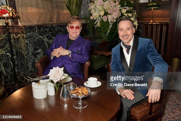 In this image released on April 25, Sir Elton John and David Furnish attend the 29th Annual Elton John AIDS Foundation Academy Awards Viewing Party...
