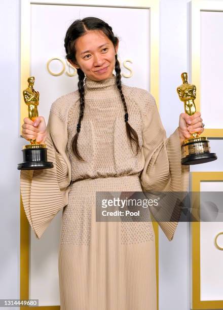 Director/Producer Chloe Zhao, winner of Best Directing and Best Picture for "Nomadland," poses in the press room at the Oscars on Sunday, April 25 at...