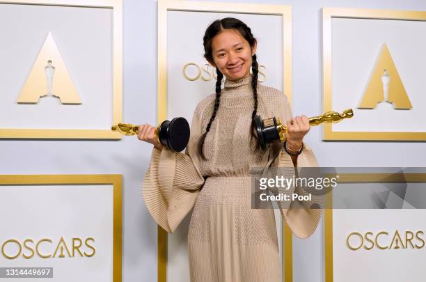 Director/Producer Chloe Zhao, winner of Best Directing and Best Picture for "Nomadland," poses in the press room at the Oscars on Sunday, April 25 at...