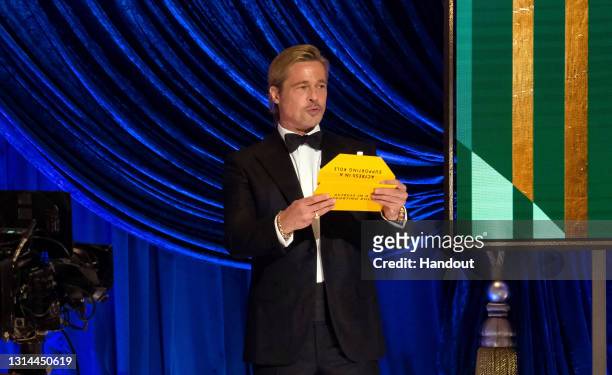 In this handout photo provided by A.M.P.A.S., Brad Pitt speaks onstage during the 93rd Annual Academy Awards at Union Station on April 25, 2021 in...