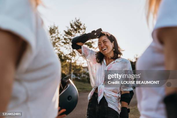 that was the best skate! - female well being at home stockfoto's en -beelden