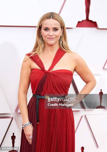 In this handout photo provided by A.M.P.A.S., Reese Witherspoon attends the 93rd Annual Academy Awards at Union Station on April 25, 2021 in Los...