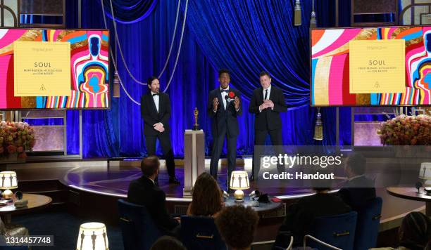 In this handout photo provided by A.M.P.A.S., Trent Reznor, Jon Batiste, and Atticus Ross accept the Music award for 'Soul' onstage during the 93rd...