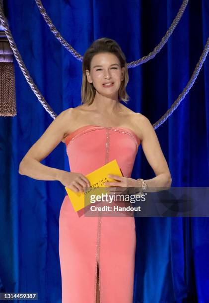 In this handout photo provided by A.M.P.A.S., Renée Zellweger presents the Oscar for Actress in a Leading Role the 93rd Annual Academy Awards at...