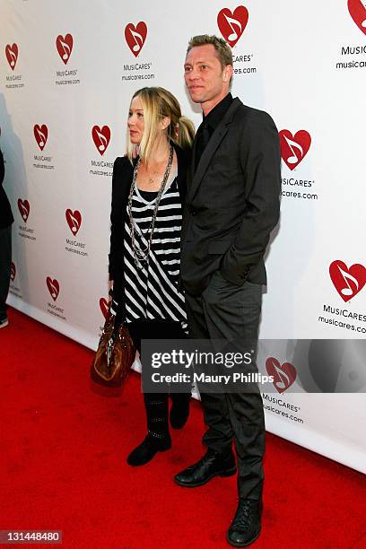 Actress Christina Applegate and Martyn LeNoble arrive at the 7th Annual MusiCares MAP Fund Benefit, which provides members of the music community...