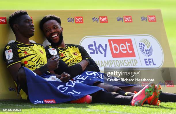 Ismaila Sarr and Nathaniel Chalobah of Watford look on at the final whistle as they are promoted to the Premier League following the Sky Bet...