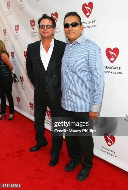 Vans Warped Tour founder Kevin Lyman and promoter Gary Tovar arrive at the 7th Annual MusiCares MAP Fund Benefit, which provides members of the music...