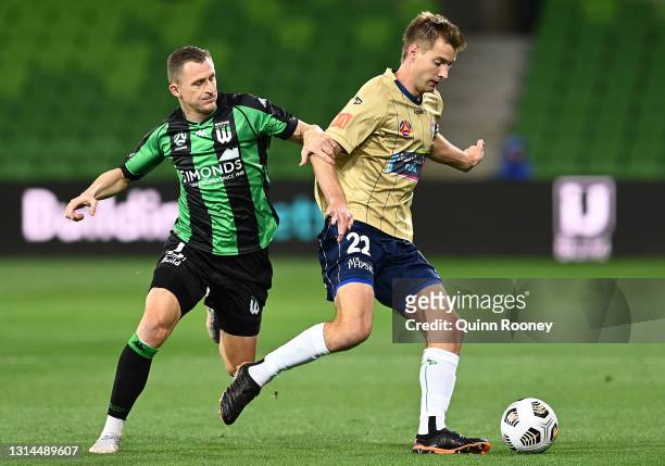 Besart Berisha of Western United and Lachlan Jackson of the Jets compete for the ball during the A-League match between Western United and the...