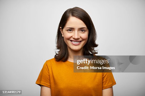 Happy Hispanic Woman Against White Background Happy Hispanic Woman Against White Background
