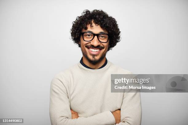 happy latin american man against white background - only men ストックフォトと画像