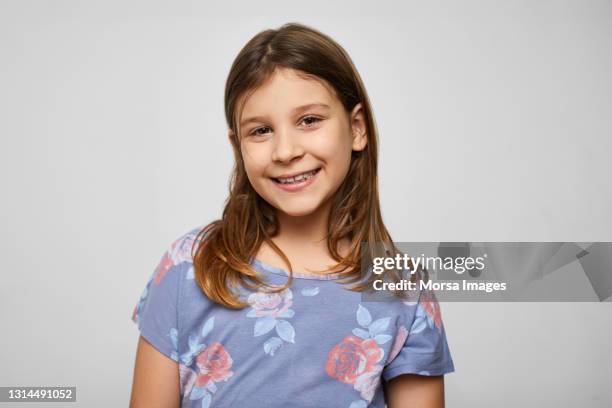 happy argentinian girl against gray background - girl who stands stock pictures, royalty-free photos & images