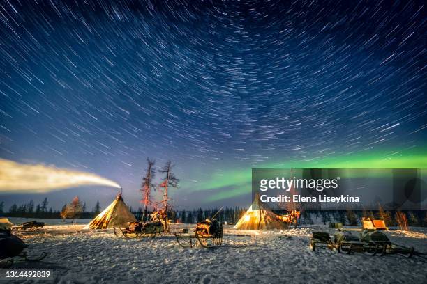 nothern lights under wild camp of the reindeer herders at yamal.russia - nenets stock pictures, royalty-free photos & images