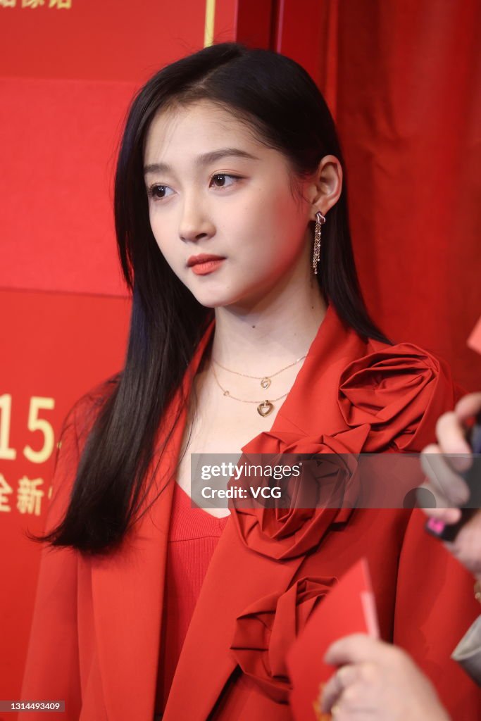 Actress Guan Xiaotong attends the unveiling ceremony of her wax