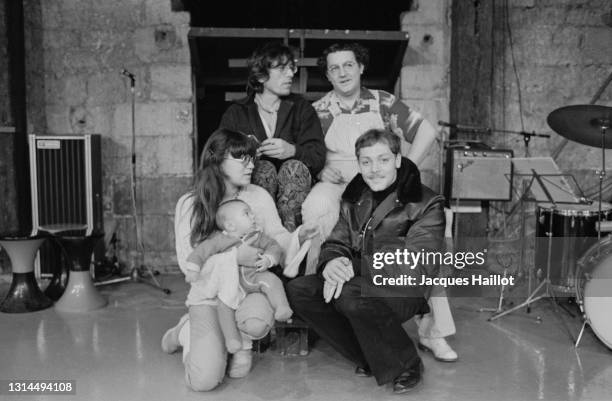 French actors Romain Bouteille, Michel Colucci aka Coluche, Sotha and Patrick Dewaere at Le Cafe de la Gare.