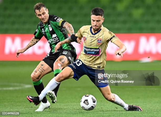 Alessandro Diamanti of Western United and Apostolos Stamatelopoulos of the Jets compete for the ball during the A-League match between Western United...