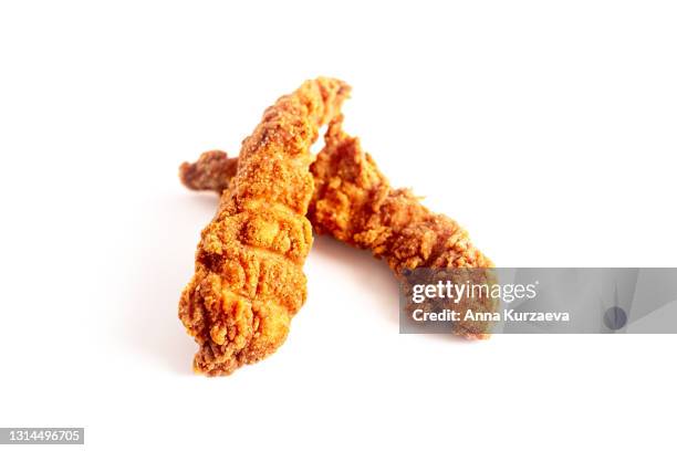 two fried chicken strips isolated on white background - fried chicken imagens e fotografias de stock