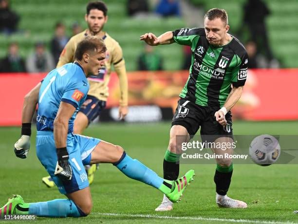 Lewis Italiano of the Jets blocks a shot on goal by Besart Berisha of Western United during the A-League match between Western United and the...