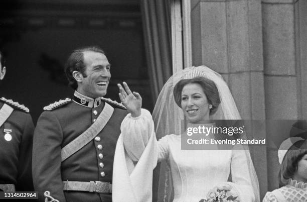 Princess Anne and Mark Phillips pose on the balcony of Buckingham Palace in London after their wedding, UK, 14th November 1973.