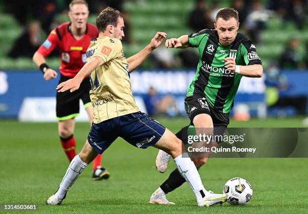 Besart Berisha of Western United controls the ball past Angus Thurgate of the Jets during the A-League match between Western United and the Newcastle...
