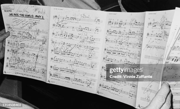 Autographed sheet music for the charity single 'We Are the World' at A&M Recording Studios in Los Angeles, California, January 1985. The song,...