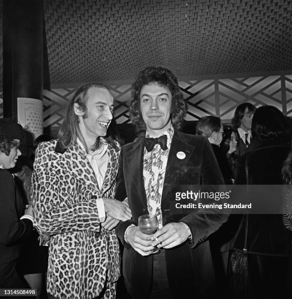 Actor and songwriter Richard O'Brien with actor and singer Tim Curry, his co-star in the stage musical 'The Rocky Horror Show', at the Evening...