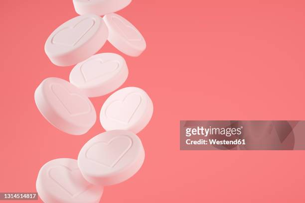 pills with social media likes 3d illustration - social media stock illustrations