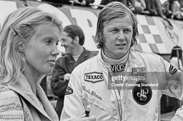 Swedish racing driver Ronnie Peterson with his girlfriend Barbro Edwardsson during the 1973 British Grand Prix at Silverstone, UK, 14th July 1973.