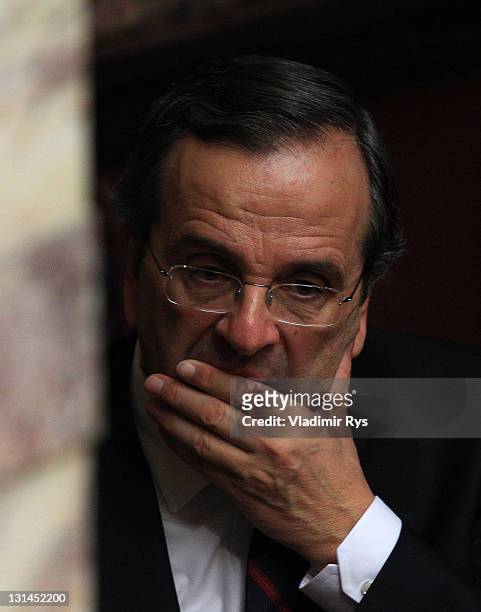 Opposition leader Antonis Samaras lokos on during the confidence vote for the government of Prime Minister George Papandreou in the Greek parliament...