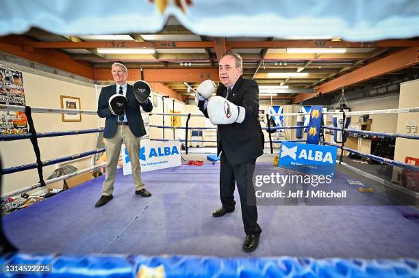 Former First Minister and leader of the Alba Party, Alex Salmond, poses for a picture with Kenny MacAskill in the boxing gym of former world champion...