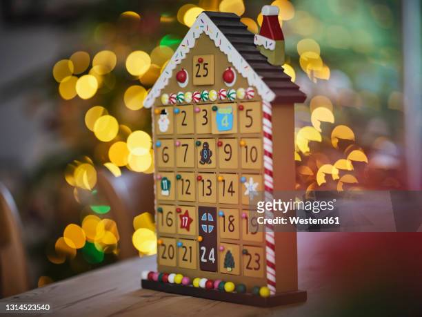 advent calender on table at home - christmas countdown stock pictures, royalty-free photos & images