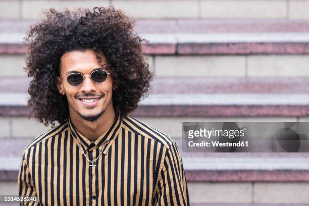 Handsome Man Sunglasses Photos and Premium High Res Pictures - Getty Images