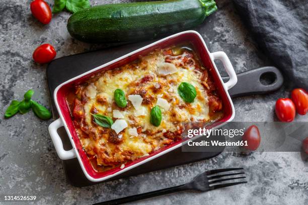 studio shot of freshly made low carb vegetarian lasagna - serving lasagna stock pictures, royalty-free photos & images